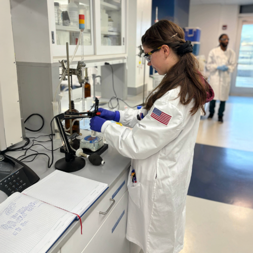 Lab technician analyzing a sample. 